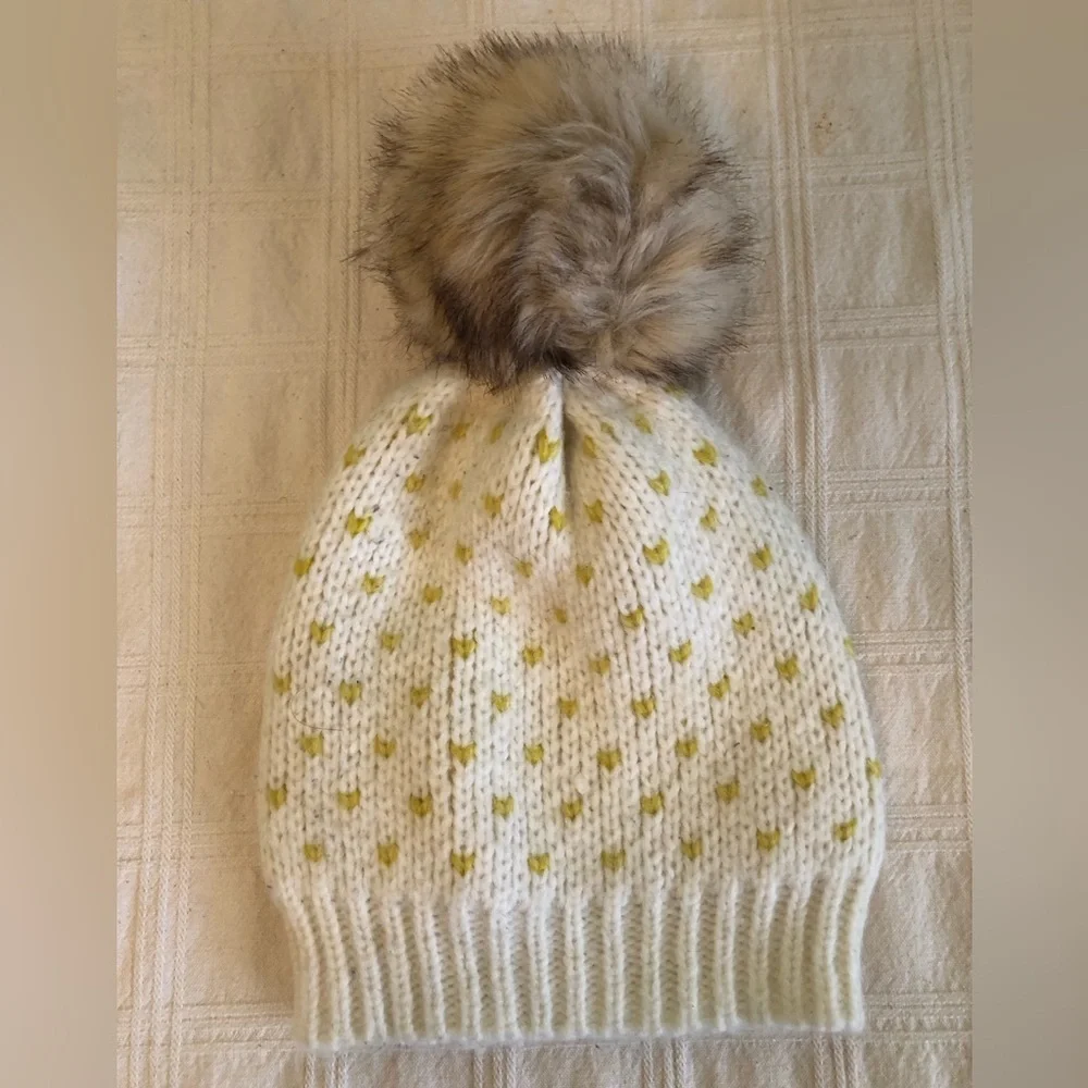 eerie off white and yellow beanie with pompom one size fits most